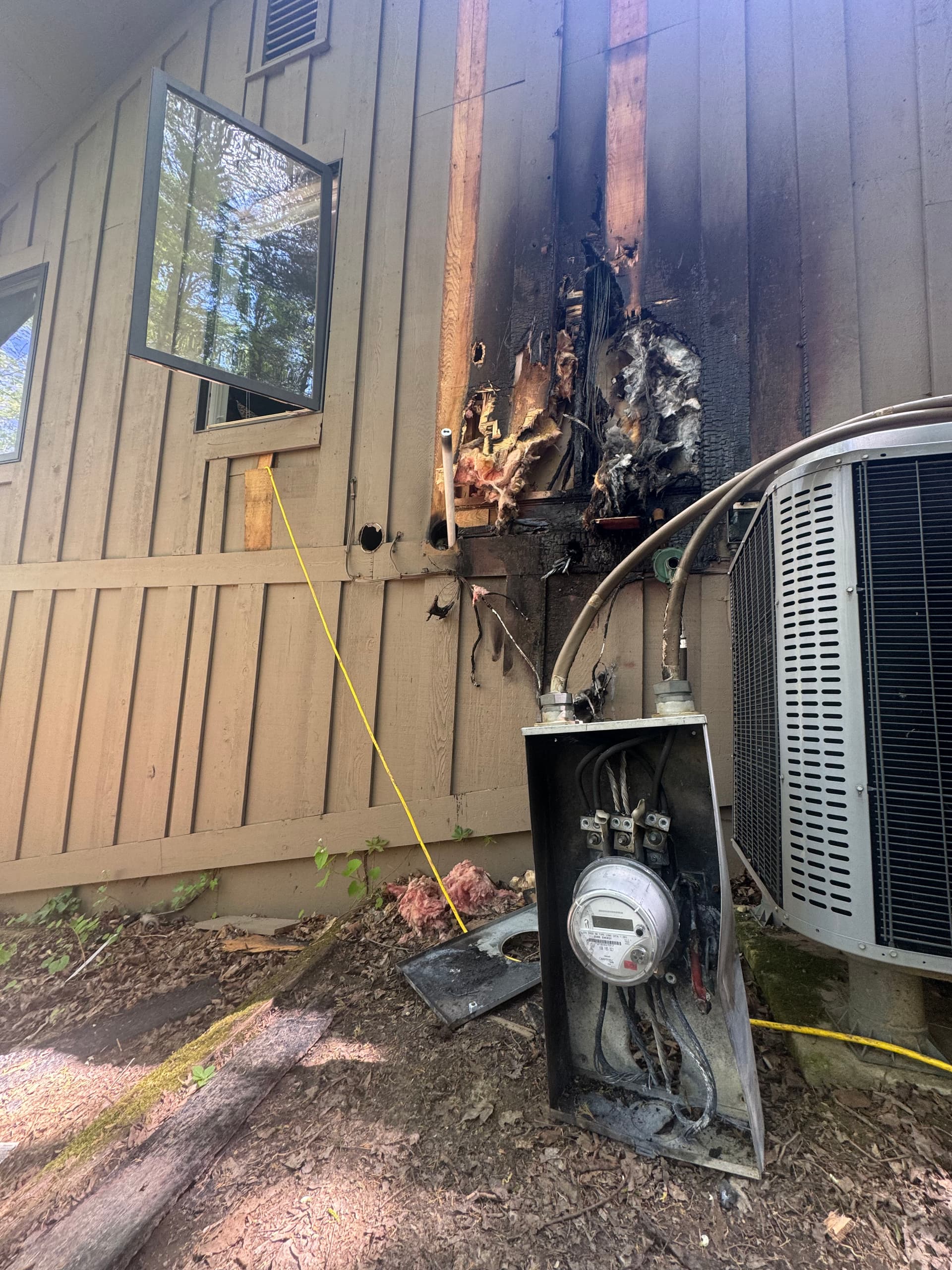 Storm-damaged electrical system fire leads to temporary power pole install image
