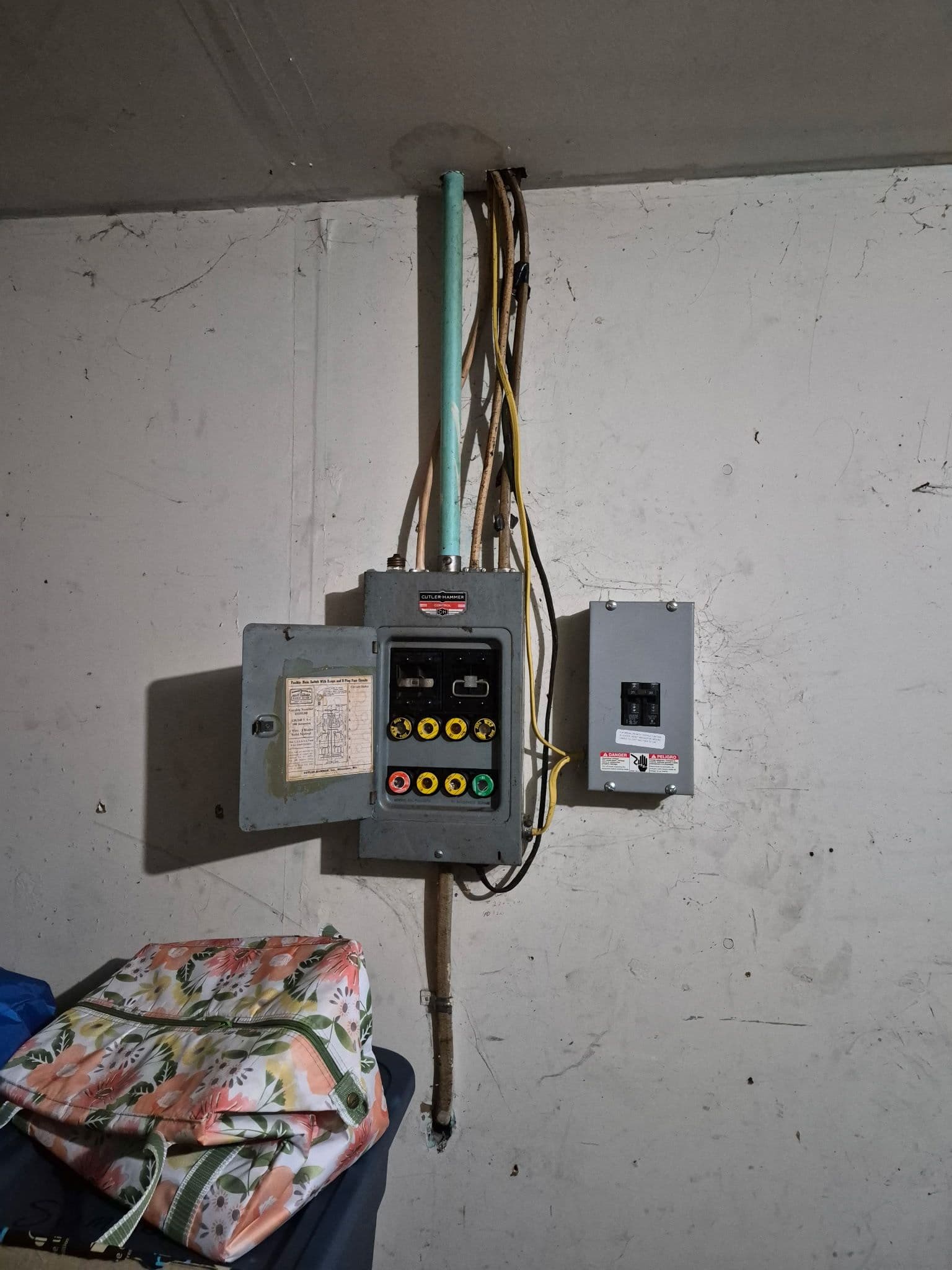 Old Fuse Box and Worn Service Entrance Cable Replaced with New Panel image